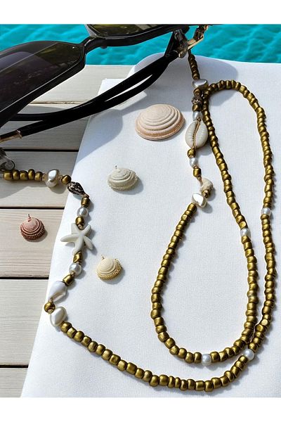 Amabel Jewelerys حبل نظارات صيفي للسيدات من حبات رملية ذهبية مع تفاصيل من صدف المحار ونجم البحر واللؤلؤ