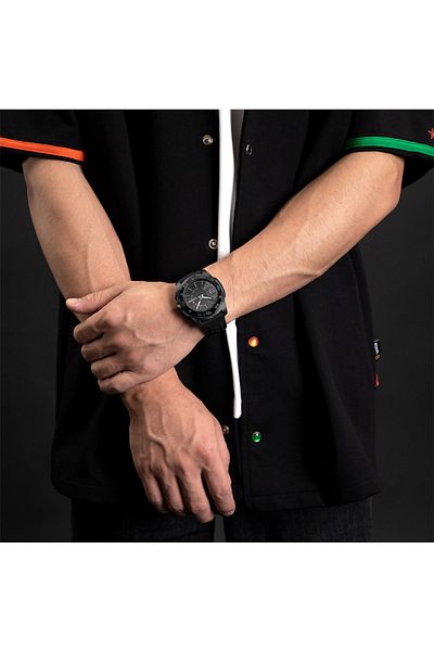 Naviforce Sleek All-Black Silicone Strap Watch with Textured Dial Quartz Movement and Water Resistance
