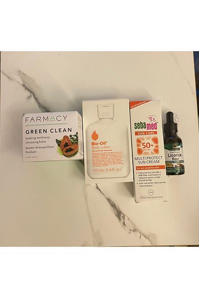 Bio-Oil 4-piece package: Bio-Oil Firming Lotion, Sebamed Sunscreen Cream SPF 50, and Liquorice Serum