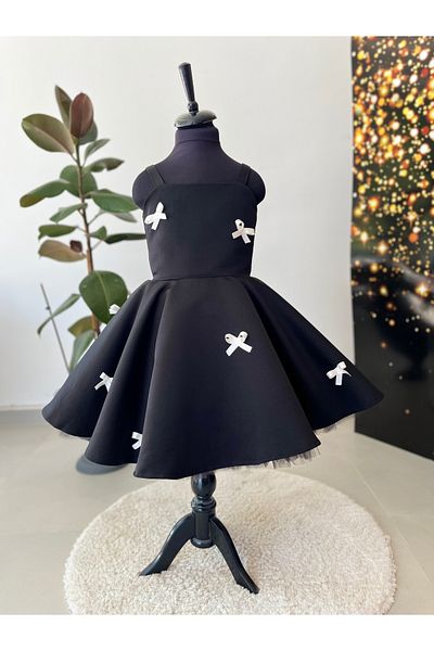 İkrabutikbursa Black Girl's Dress – White Bow Detail, Sleeveless, Flared Cut, Stylish and Elegant Design