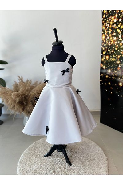 İkrabutikbursa Gray Girl's Dress – Black Bow Detail, Flared Cut, Sleeveless, Stylish and Modern Design