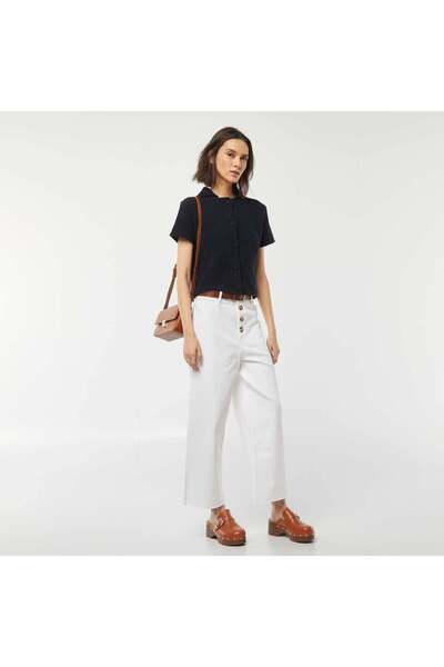 KIABI بنطال جينز واسع الساق مع أزرار أنيقة باللون الأبيض