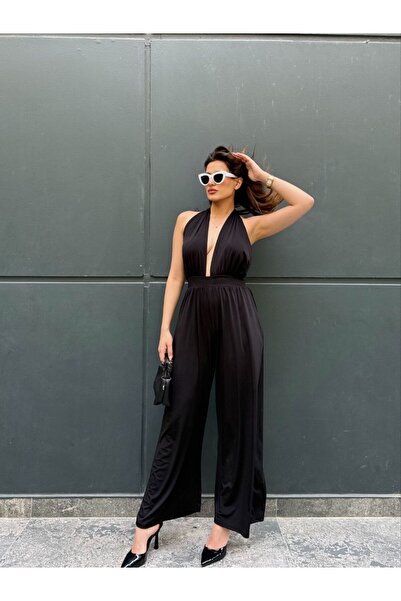 Butik Kadın tulum , göğüs ve sırt dekolteli ,sıfır kol , zarif ,gece elbisesi...