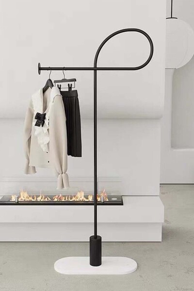 Generic a modern, minimalist floor-standing coat, Abaya and clothes rack, a Nordic and light luxury design