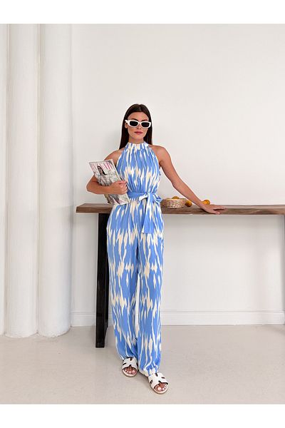 Cistern İstanbul Women's Blue Patterned Halter Neckline Waist Belted Jumpsuit