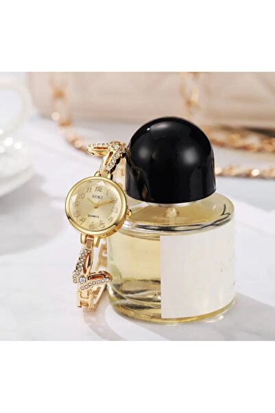 stainless steell VİP gold renk kelebek motifli zarif saat