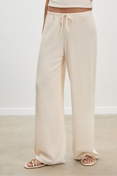 Stradivarius Flowing creased-effect trousers