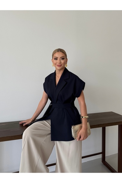 Nadrina Low sleeve oversize belted vest