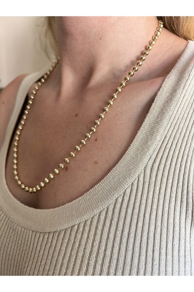 Butik قلادة دوريكا ذات السلسلة الطويلة، لون ذهبي - مظهر لامع وتحركي ديزي