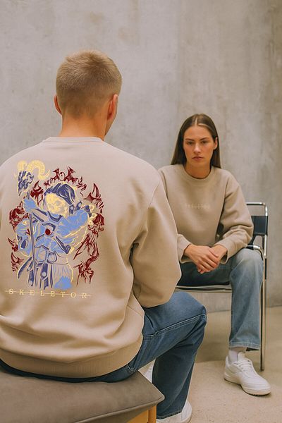 By Caspita Fashion Lenithra He-Man Skeletor Anime με στάμπα Unisex Oversize μπεζ φούτερ
