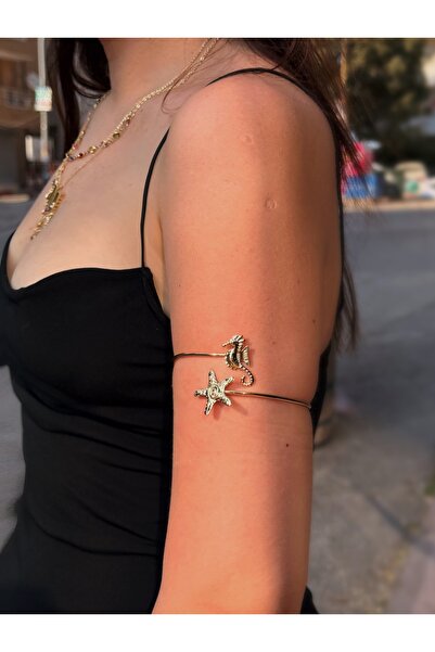 luxyansımalar بازو مع شكل الحصان البحر والنجوم