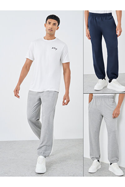 Styli عبوة من قطعتين - بنطال رياضي مريح من قماش تيري سادة مع أطراف مطاطية