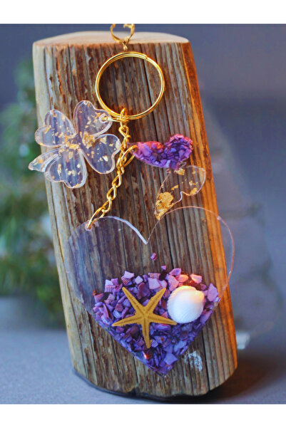 Gelinrehberi سلسلة مفاتيح إيبوكسي من أحجار البحر الشفافة من رقائق الذهب على ش...