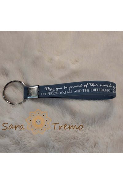 saratremo Keychain with Silicone Strap – Metal Clasp and Motivational Message in English