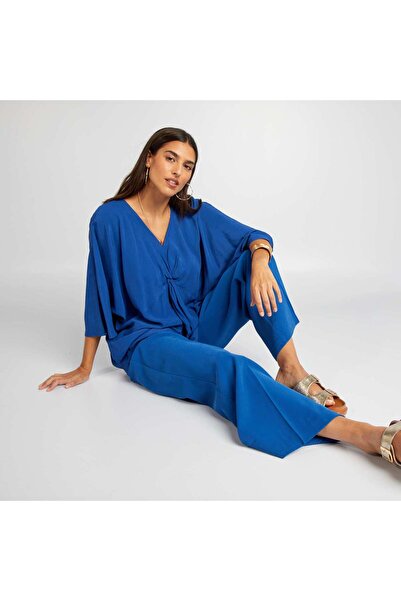 KIABI بلوزة واسعة بأكمام قصيرة باللون الأزرق