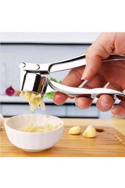 Generic Multi-colored garlic press, herb chopper, and nut cracker