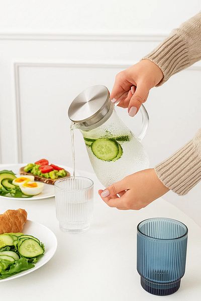MARIA HOMES Clear Textured Glass Water Pitcher with Stainless Steel Lid – 1.3 Liter
