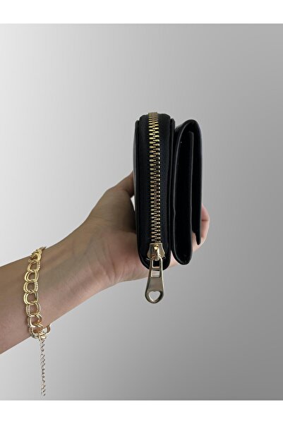 shiny ever Μαύρη γυναικεία τσάντα πορτοφόλι με χρυσή λεπτομέρεια