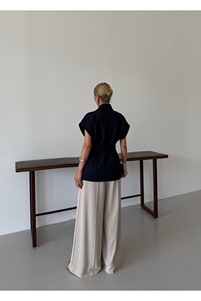 Nadrina Low sleeve oversize belted vest