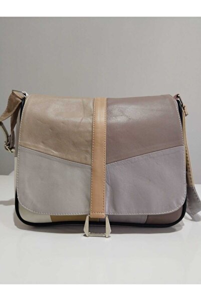 atter GEANT DE FEMEI DIN PIELE VERITĂ (28CM X 25CM)