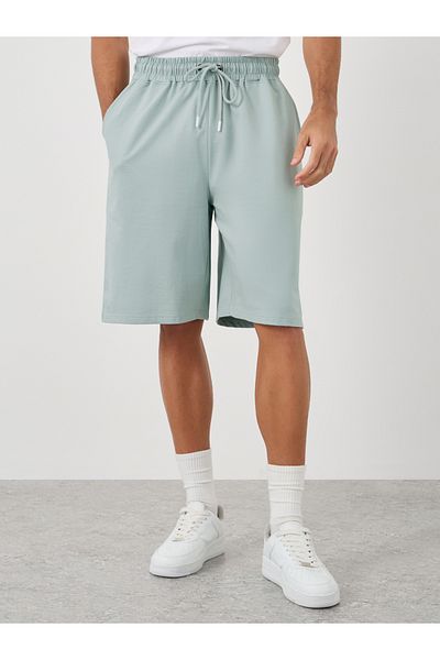 Styli Solid Oversized Shorts with Drawstring