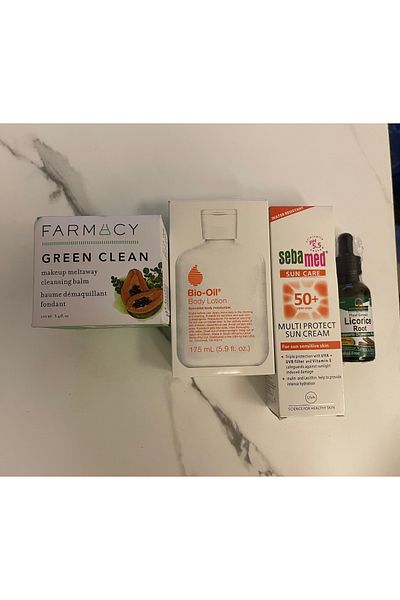 Bio-Oil 4-piece package: Bio-Oil Firming Lotion, Sebamed Sunscreen Cream SPF 50, and Liquorice Serum