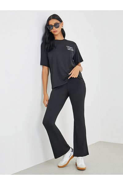 Styli Slogan Printed T-Shirt and Flared Leggings Co-Ords