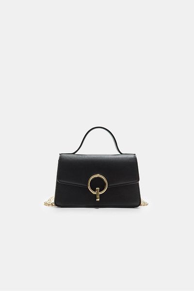 Stradivarius Crossbody bag with a round clasp