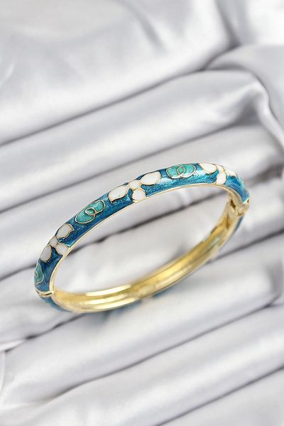 Clariss Mineli Brass Blue and White Flower Motif Gold Color Women's Handcuffs