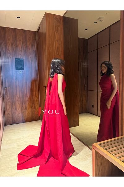 4YOU Red dress featuring a cross neckline and a long cape at the back