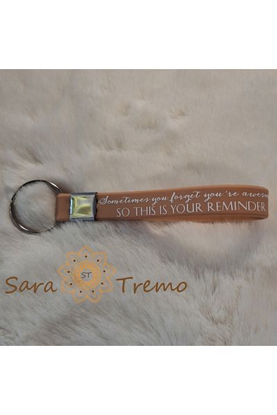 saratremo Keychain with silicone strap – metal clasp and motivational message in English