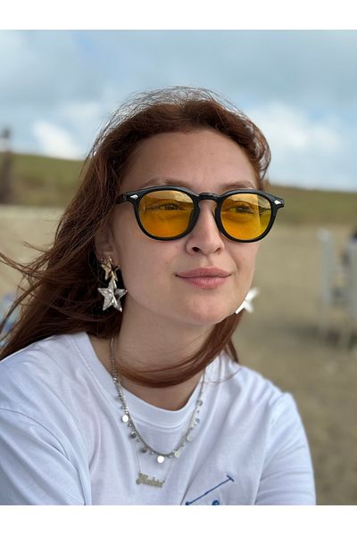 Ferrucci Brand Oval Unisex Sunglasses with Black Frame and Yellow Transparent Glass