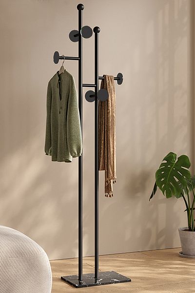 Generic a modern, minimalist floor-standing coat, Abaya and clothes rack, a Nordic and light luxury design