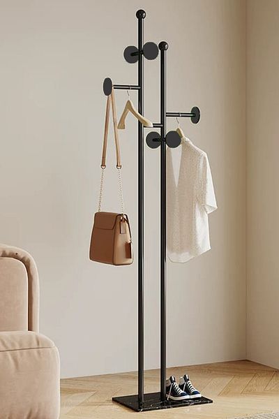 Generic a modern, minimalist floor-standing coat, Abaya and clothes rack, a Nordic and light luxury design