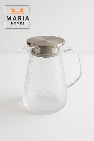 MARIA HOMES Clear Textured Glass Water Pitcher with Stainless Steel Lid – 1.3 Liter
