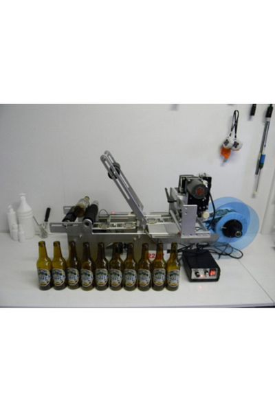Jobs ahead group Labeling machine with batch date printing