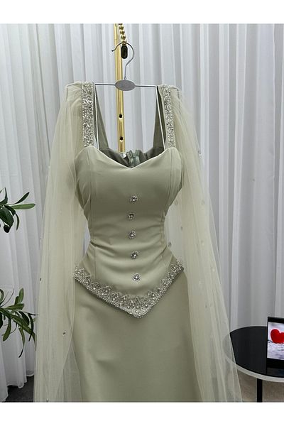 Diva style Evening dress with a modern and elegant design, with tulle and hand embroidery