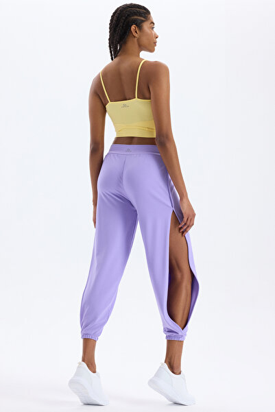 COMEUP Pantaloni cu picioare elastice și fante laterale, violet ametist