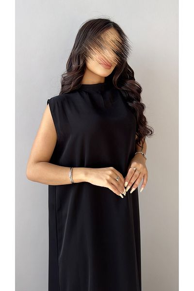 outline Black abaya package with a formal collar and a dress underneath the abaya