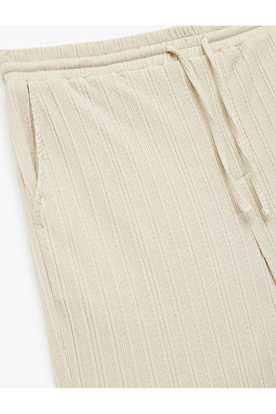 Koton Textured Bermuda Shorts with Lace-Up Waist and Pocket Detail