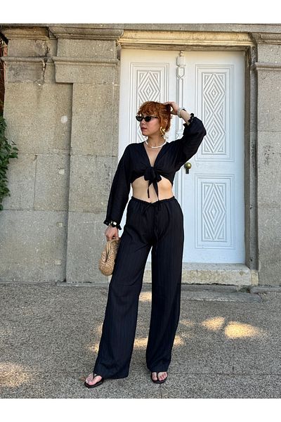 Bak'ap طقم مكون من قطعتين من قماش الكتان الفاخر المزين بشراشيب وربطة عنق من Palazzo Pants