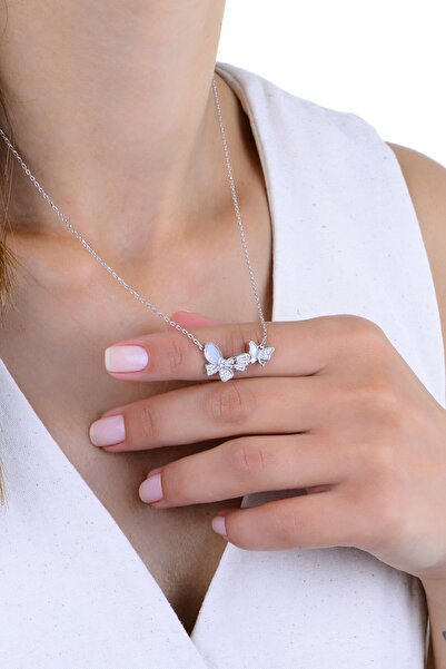 Söğütlü Silver Gümüş rodyumlu mineli baget kesim zirkon taşlı çiftli aşk kele...