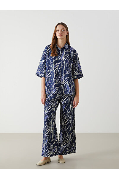 LC Waikiki Gemusterte Damenhose mit weitem Bein und elastischem Bund