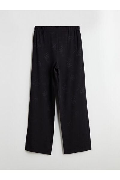 LC Waikiki Μαύρο γυναικείο παντελόνι με ελαστική μέση και φαρδιά λουλουδάτα μ...