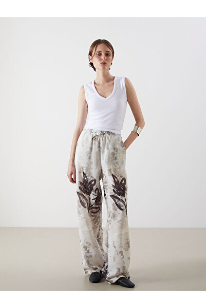 LC Waikiki Nevavm Women's Wide Leg Floral Trousers with Elastic Waist and Dif...