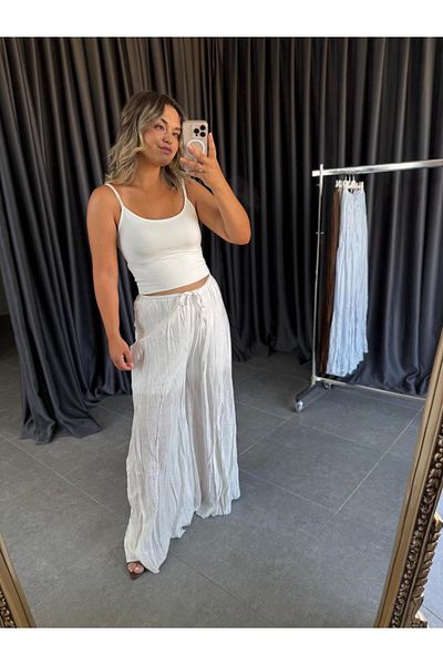 BÜŞRA PERKER Relaxed Cut Pleated Trousers
