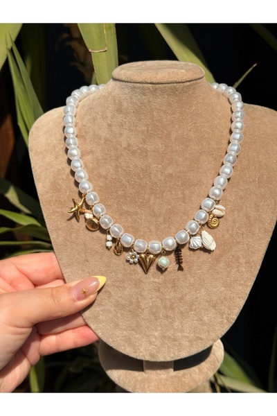 luxyansımalar قلادة سحر الصلب