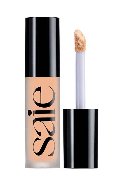 SAIE خافي العيوب Slip Tint Total Radiant مع النياسيناميد، 8 - فاتح/متوسط مع درجات لونية دافئة