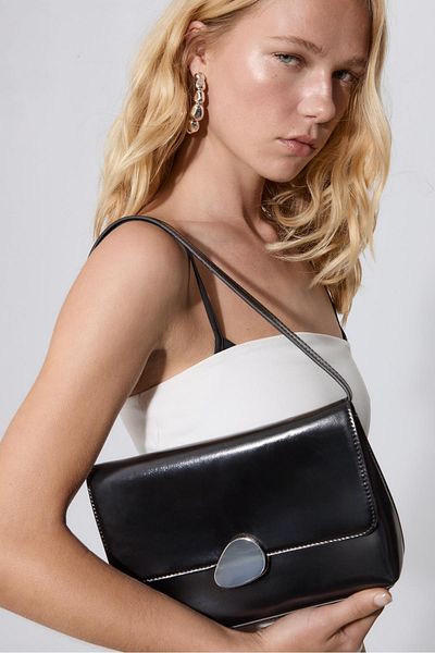 Stradivarius Bag with asymmetric metal clasp