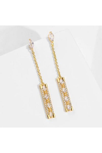 Eva Grace Golda earrings, long, golden, rectangular in shape, decorated with zirconium
